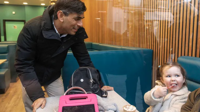 Rishi Sunak interacts with a young girl during a walkabout in Winchester, Hampshire earlier this week (Photo: Dan Kitwood/PA Wire)